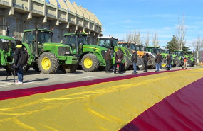 ep tractores aparcados en la inmediaciones del estadio jose zorilla de valladolid junto a la bandera