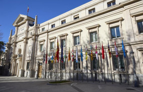 ep archivo   banderas de las comunidades autonomas frente a la fachada del palacio del senado en