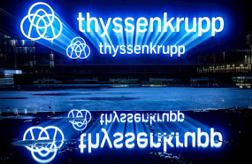 ep filed - 20 november 2019 essen the thyssenkrupp logo is reflected on a water surface two former