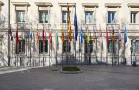 ep archivo   banderas de las comunidades autonomas frente a la fachada del palacio del senado