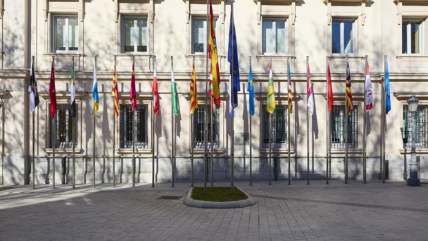 ep archivo   banderas de las comunidades autonomas frente a la fachada del palacio del senado
