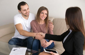 1611333448 happy young couple and broker manager handshaking after signing contract 1611333448 happy young couple and broker manager handshaking after signing contract
