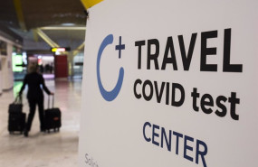 ep archivo un cartel en el que se lee travel covid test center en la terminal t4 del aeropuerto ep archivo un cartel en el que se lee travel covid test center en la terminal t4 del aeropuerto