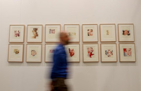 ep archivo   un visitante pasa por delante de las obras de la galeria max estrella en la 30 edicion