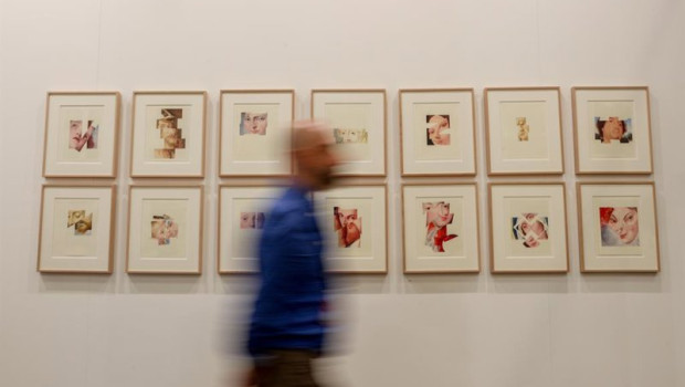 ep archivo   un visitante pasa por delante de las obras de la galeria max estrella en la 30 edicion
