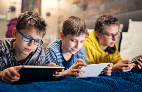 kids on tablets together