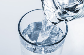 top view jar filling glass water 