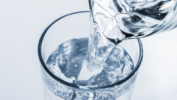 top view jar filling glass water 