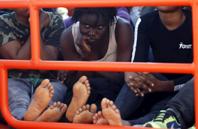 ep llegada al puerto malaga de 75 personas donde han sido rescatadas por salvamento maritimo cuando
