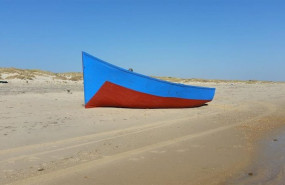 ep una patera en a la playa recurso
